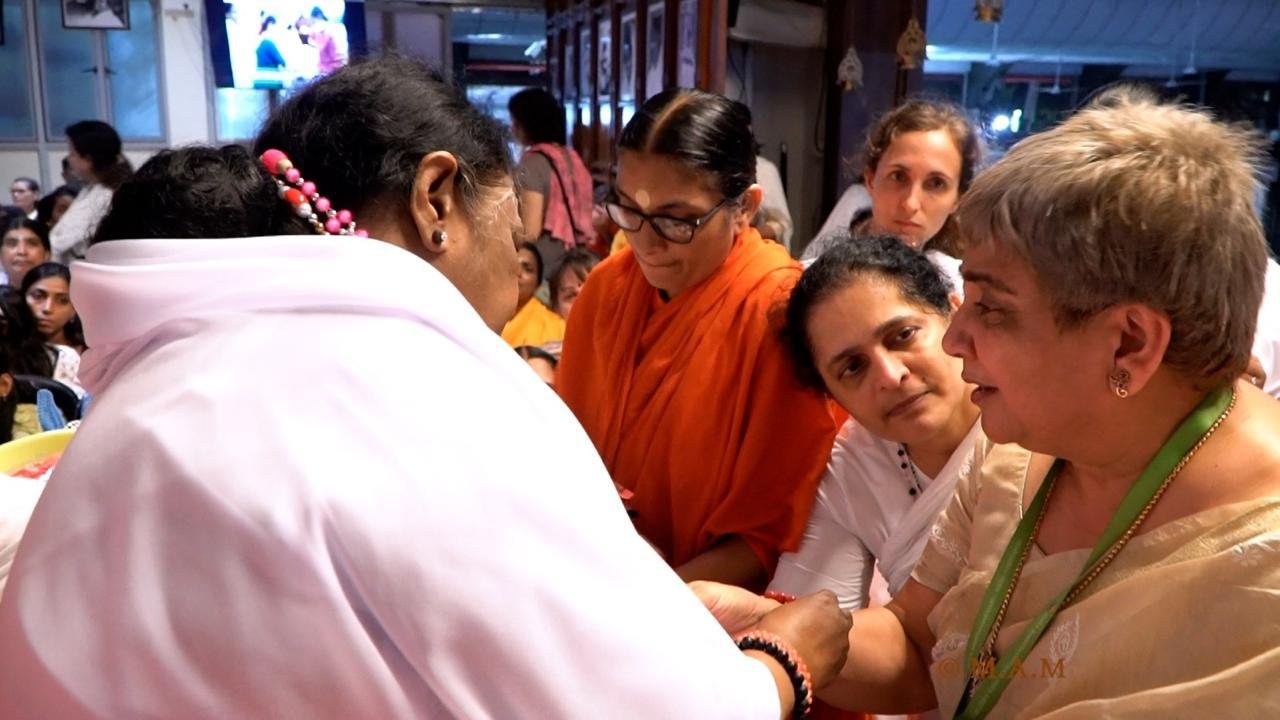 Receiving Sacred Thread from Amma